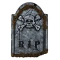 1.5 Ft Skull Face Tombstone with Moss at Spirit Halloween