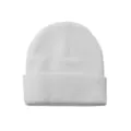 White Beanie Hat at Spirit Halloween