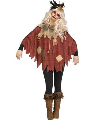 Young Creepy Woman With Halloween Makeup Mask In Scarecrow Costume