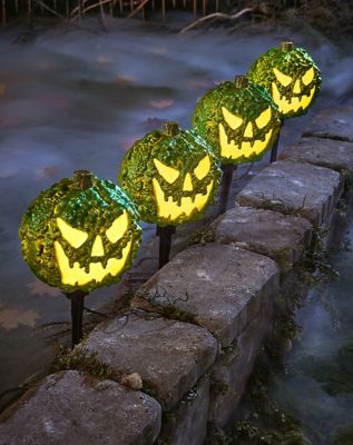 Light-Up LED Green Jack-O-Lantern Pathway Markers - Spirithalloween.com