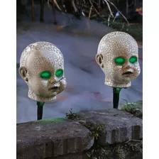 Light-Up LED Cracked Doll Pathway Markers at Spirit Halloween