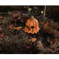 Ground Breaking Rotten Pumpkin Decoration at Spirit Halloween