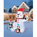 6 Ft 11 In Light-Up Animated Polar Bear with Penguins Inflatable Decoration at Spirit Halloween