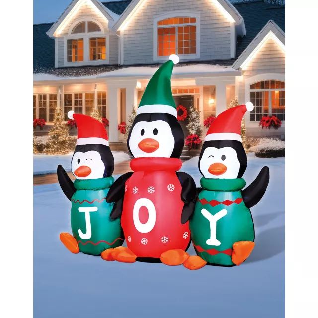 5 Ft 6 In Light-Up Musical Penguin Trio Inflatable Decoration at Spencer's
