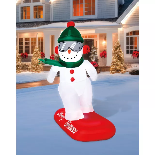 4 Ft Snowboarding Snowman Inflatable Decoration at Spencer's