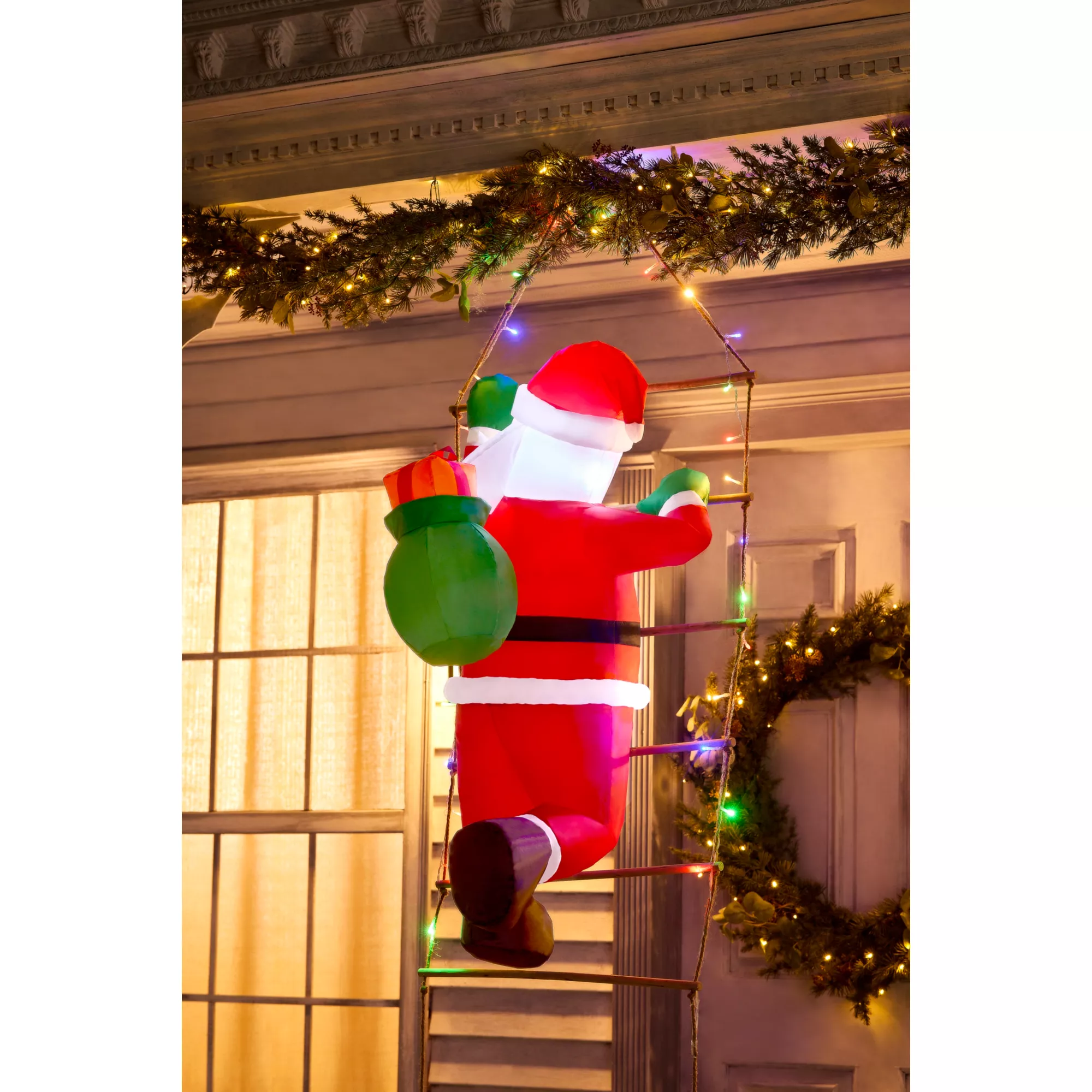 3 Ft Light-Up Santa Climbing Ladder Inflatable Decoration at Spencer's