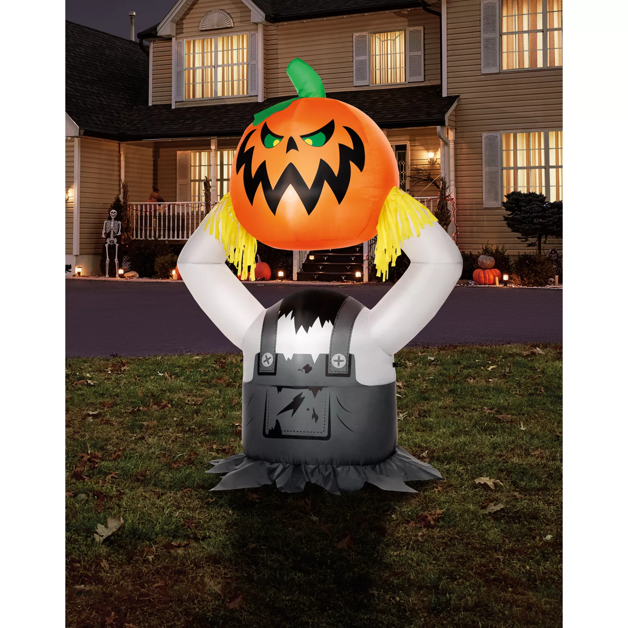 5 Ft 6 In Light-Up Pumpkin Scarecrow Inflatable Decoration at Spirit Halloween