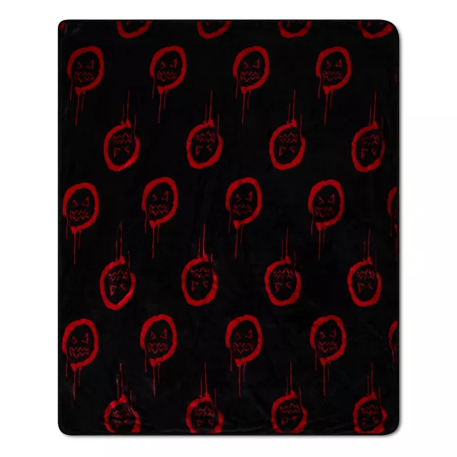 Split Face Sam Fleece Blanket - Trick 'r Treat at Spencer's