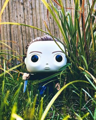 Michael Myers Halloween figure in yard