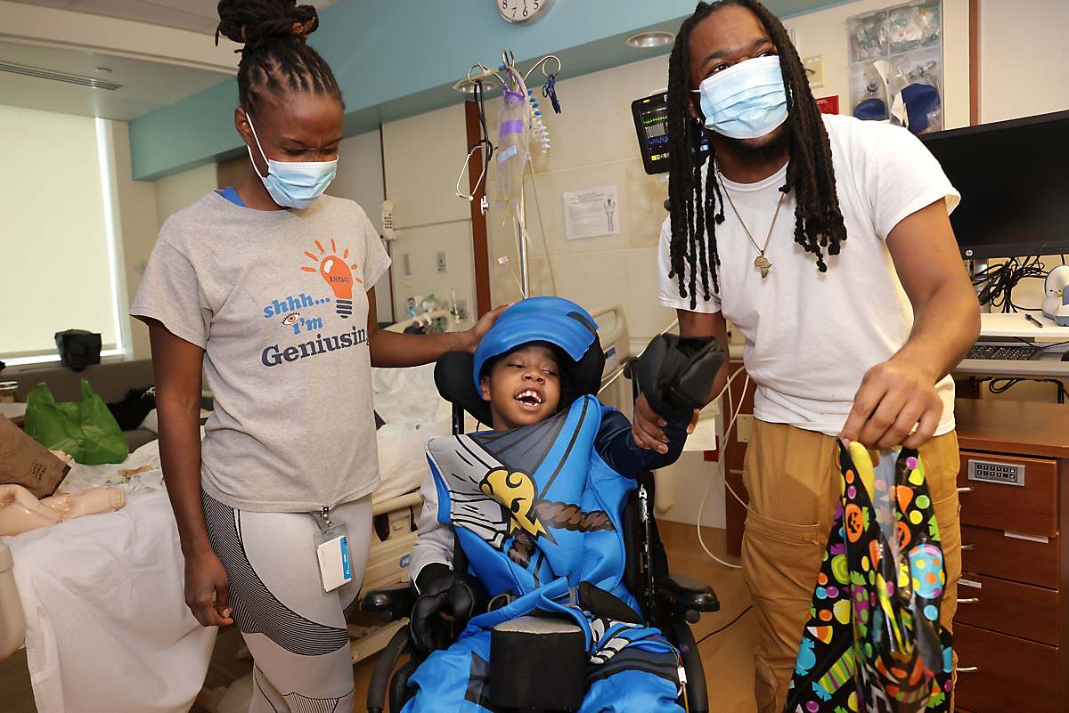 Child patient and hospital staffers at Spirit of Children Sensory Motor Room Dedication at Mt. Washington Pediatric Hospital in Baltimore